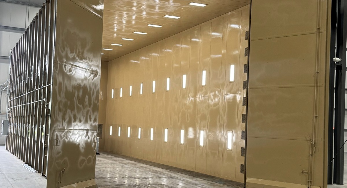 Interior of Carolina Heavy Steel's enclosed abrasive blast booth